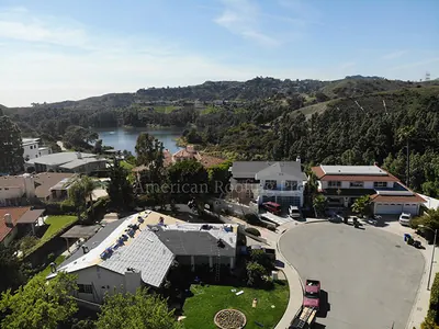 Aerial documentation of a finished residential roof replacement.